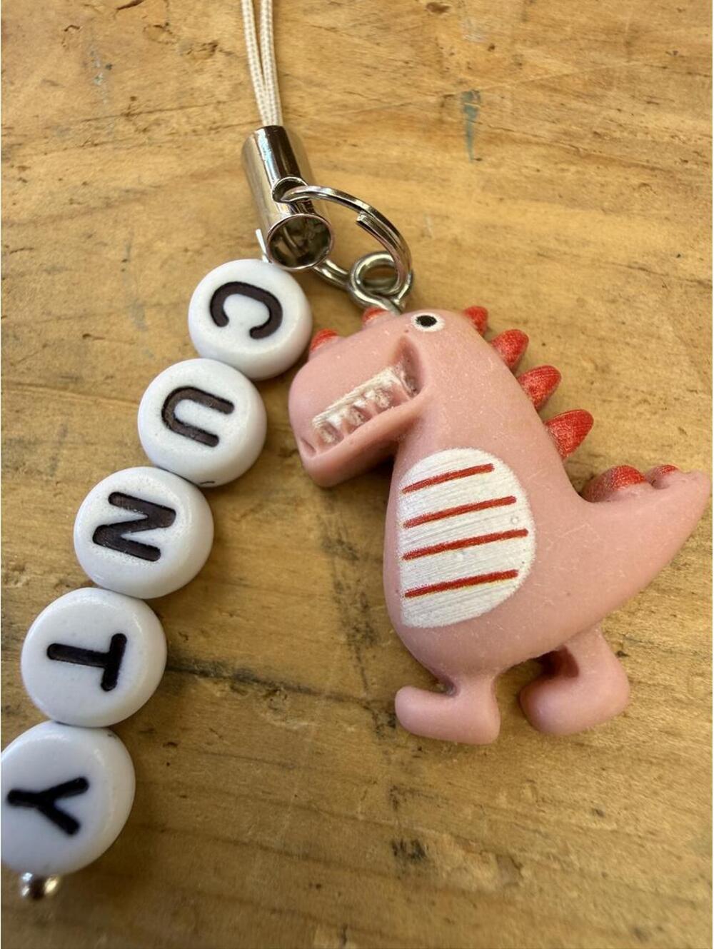 Cunty. Tiny dinosaur. Massive emotional support for your inner menace.